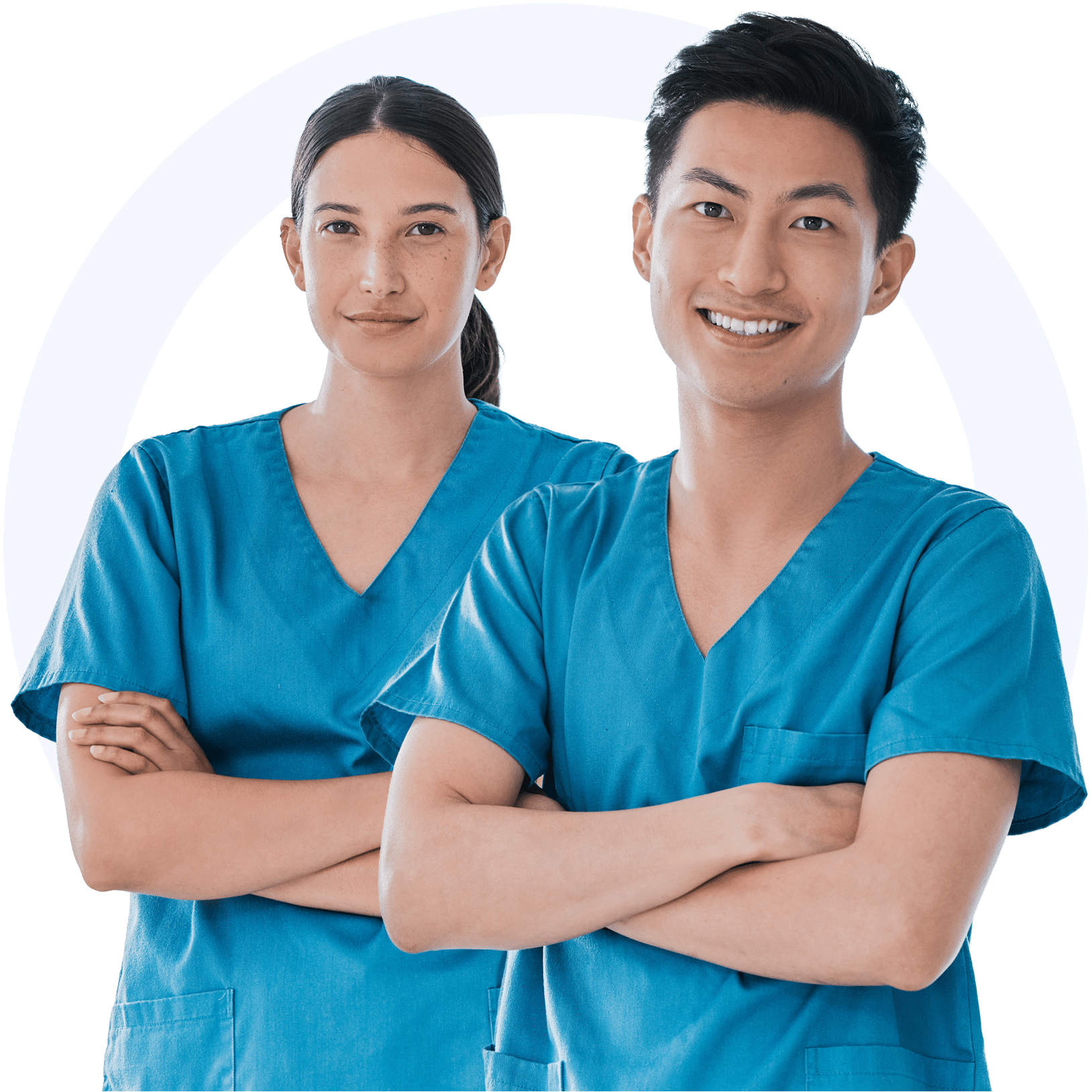 Man and woman in scrubs smiling