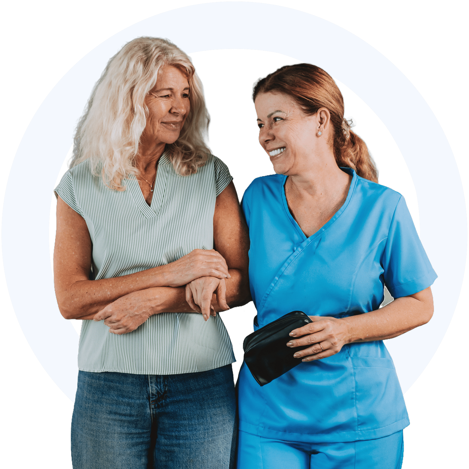 Woman in scrubs helping woman walk